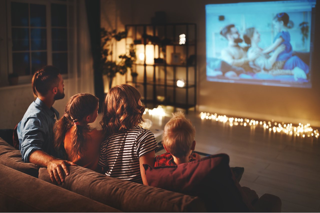 Family watching movie.