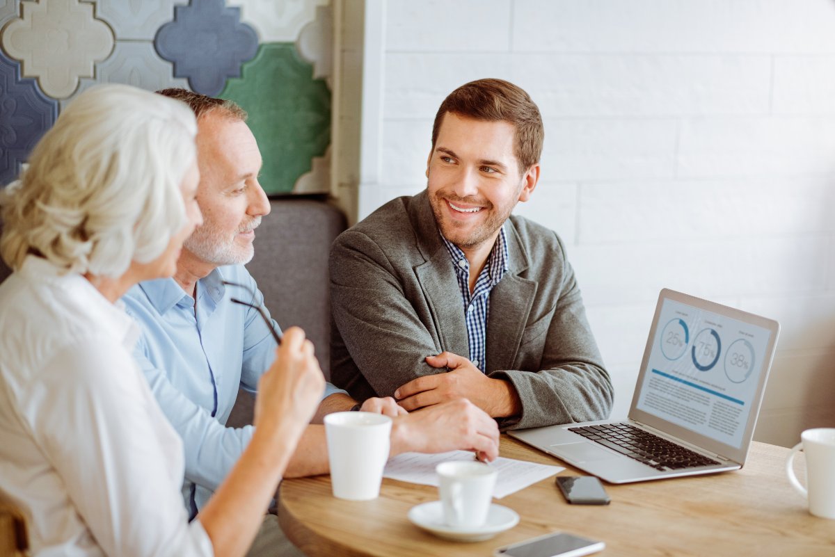 Retired couple meeting with tax advisor.